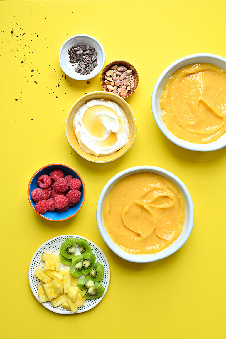 mango creamsicle smoothie bowl and toppings
