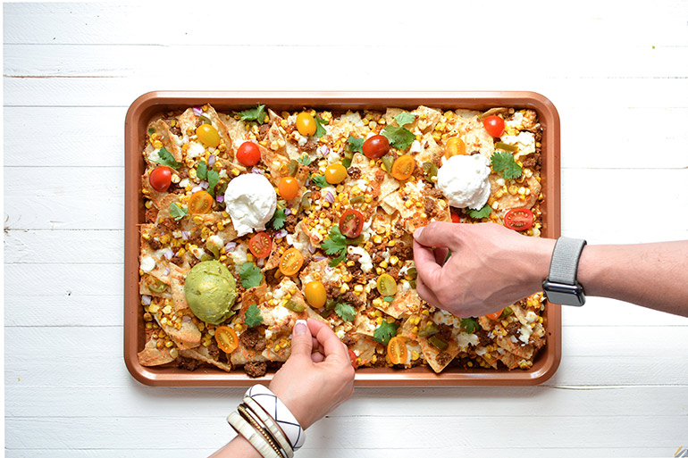 tray of nachos with village farms tomatoes