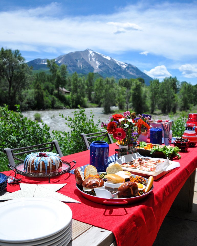 summer bbq picnic spread with mountains