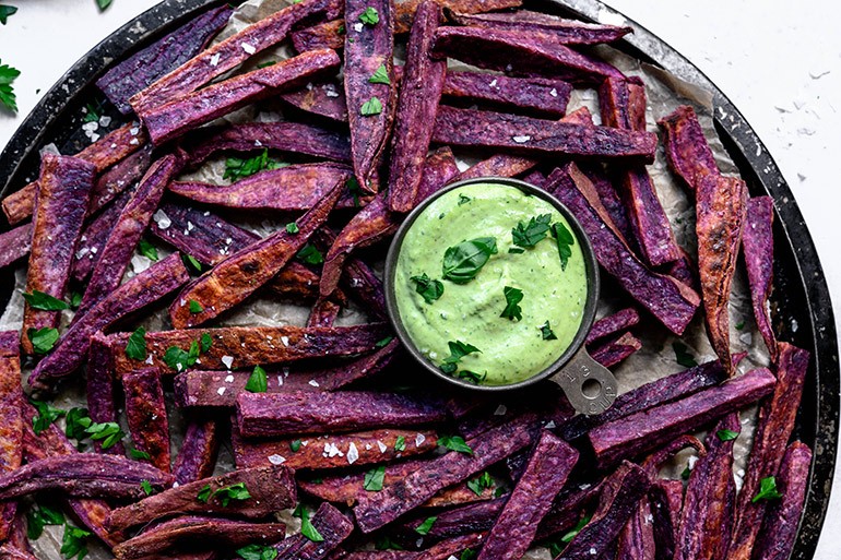 Purple Sweet Potato Fries With Herby Tahini Sauce Nosh And Nourish