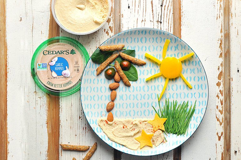 https://noshandnourish.com/sites/default/files/styles/blog_list_page_image/public/hommus-food-art-cedars-wide-770.jpg?itok=CE39MsIk