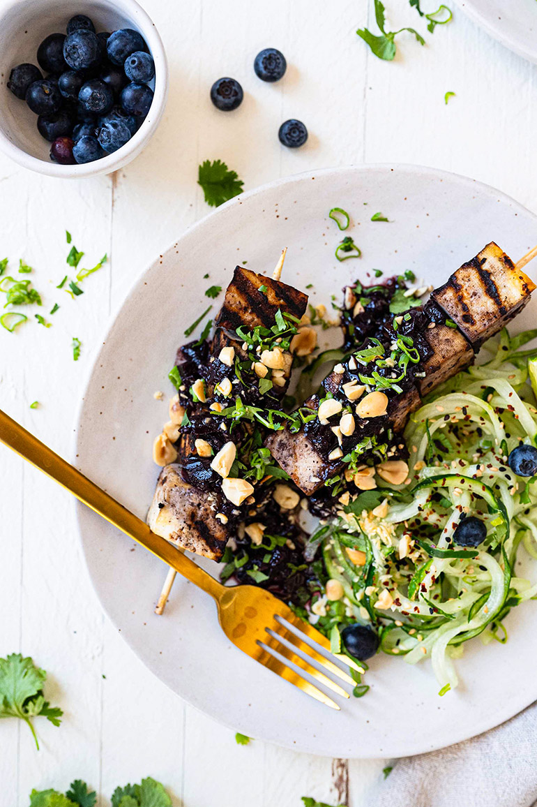 Blueberry Tofu Kebabs over noodles