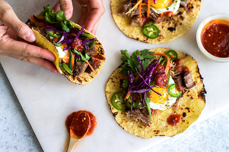 pork bahn mi breakfast tacos with red cabbage