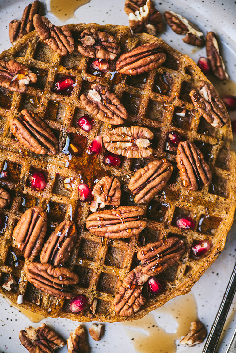 pumpkin pecan waffles with pomegranate arils