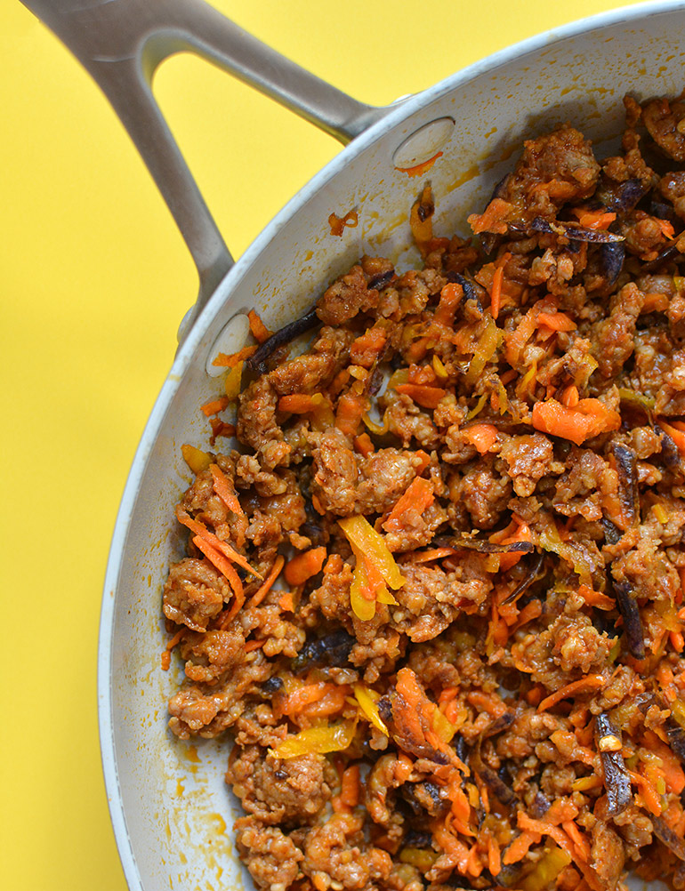 chorizo and root veggies in pan