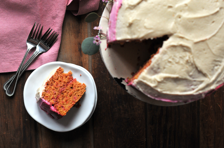 dragon fruit and strawberry cake with pink frosting