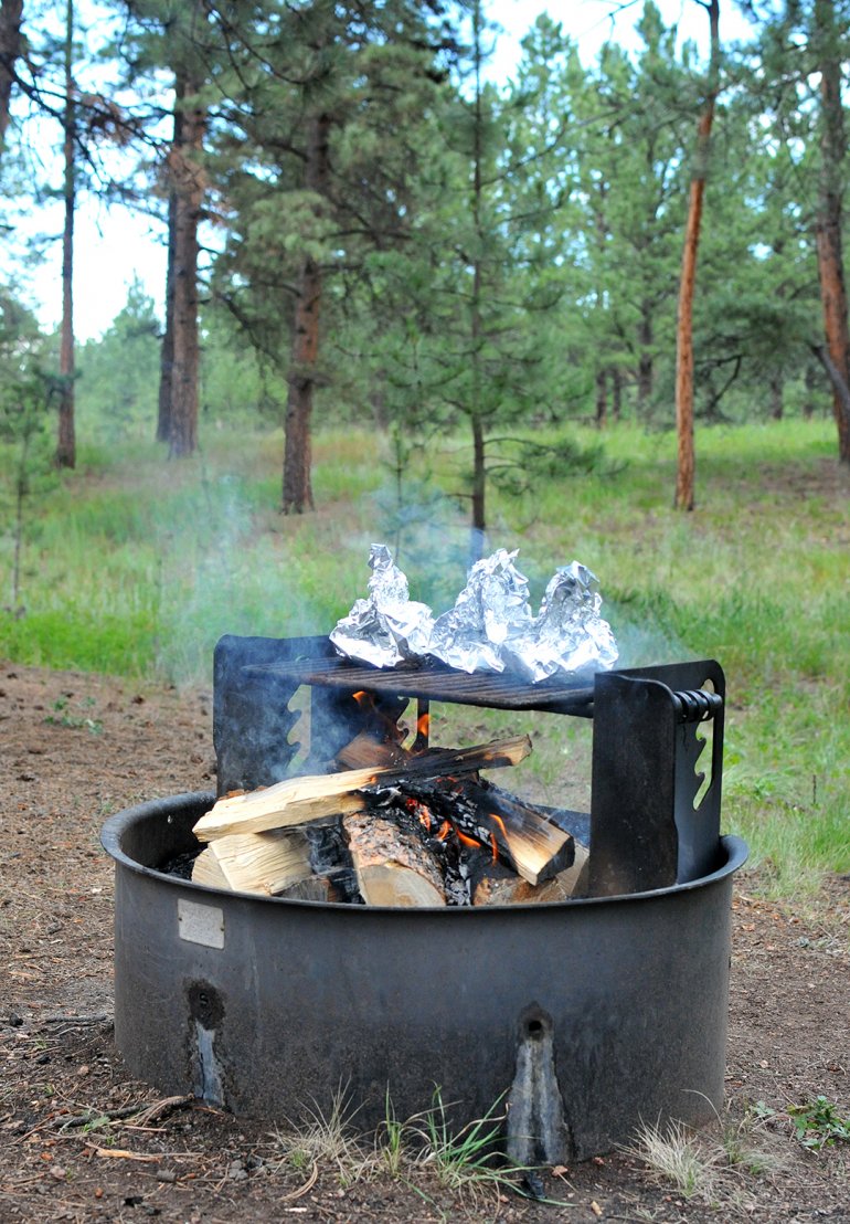 shrimp bruschetta foil packets on campfire