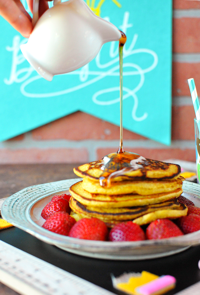 hello sunshine pancakes with syrup dripped on top