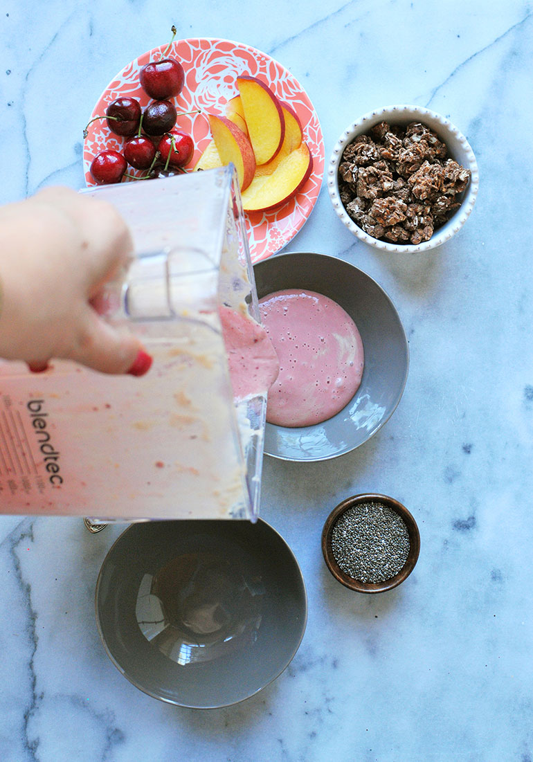 peach cherry sunrise smoothie pouring