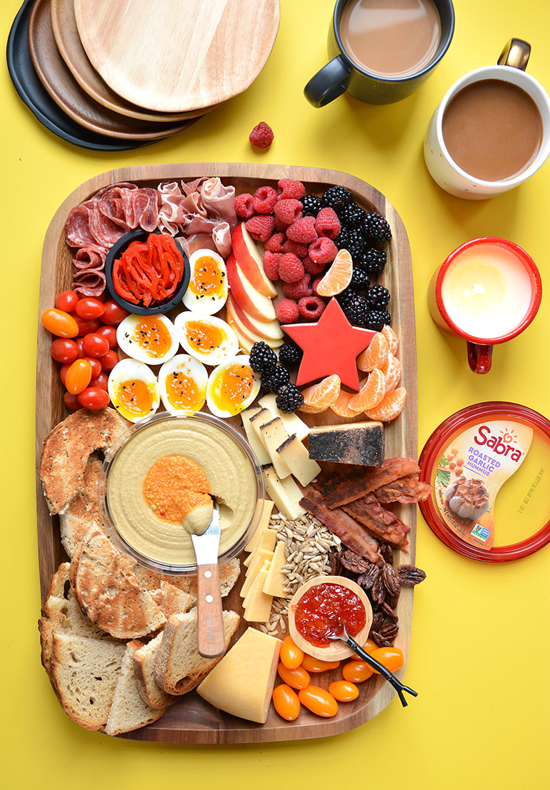 https://noshandnourish.com/sites/noshandnourish.com/files/images/sabra-full-brunch-board-770_0.jpg