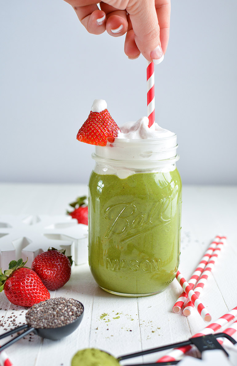 matcha grinch green smoothie with candy cane straw