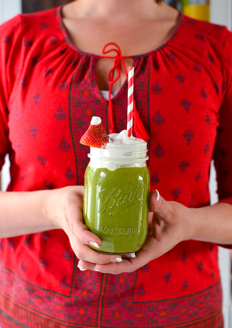 matcha grinch green smoothie in hand